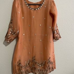 Peachy nude Organza dress with heavy gold zari,pearl & gotta work